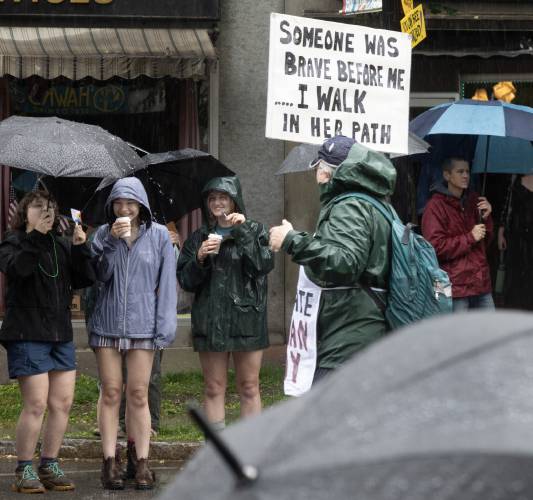 Determined not to let rain dampen their pride, participants of the 8th annual Franklin County Pride Parade in Greenfield were prepared with umbrellas and raincoats on Saturday.