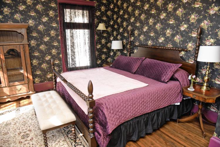 A bedroom in The Revival Wheeler Mansion in Orange. 
