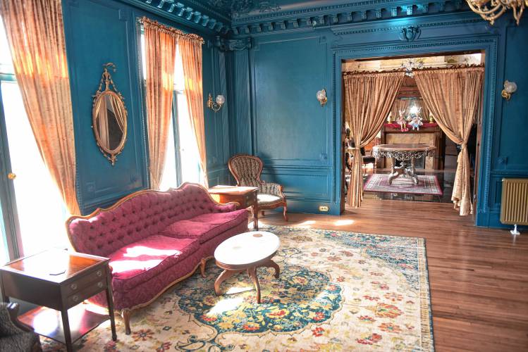 The Revival Wheeler Mansion parlor off the main entrance on East Main Street in Orange. 