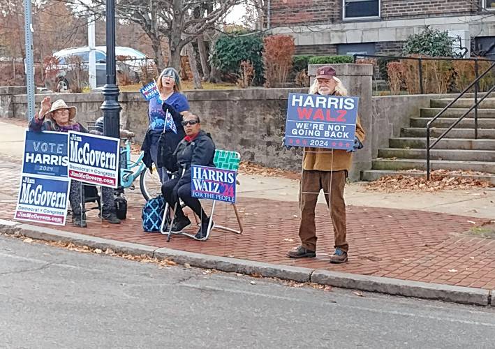 Sign-holders in Athol outside Town Hall on Tuesday, Nov. 5.