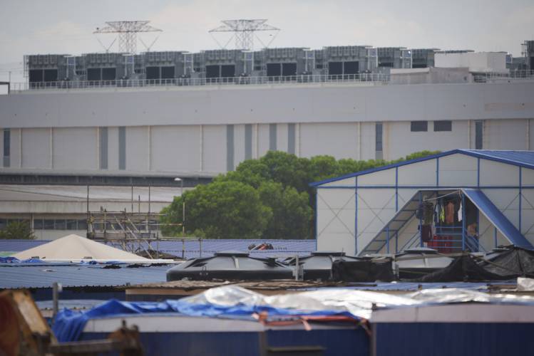 A lodging for construction workers is seen in front of a Data center in Sedenak Tech Park in Johor state of Malaysia, Sept. 27, 2024.