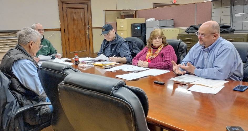 Athol Town Manager Shaun Suhoski (right) met with the Capital Program Committee to discuss his request for funds to repair the roof of the old fire station on Exchange Street and a grant match for the greening of Lord Pond Plaza. 