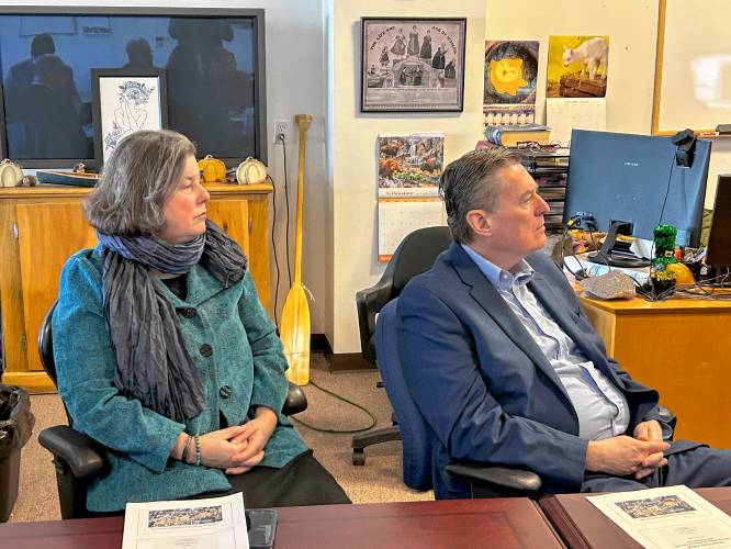 State Senator Jo Comerford and Massachusetts Department of Housing and Livable Communities Ed Augustus listen to a presentation on redevelopment plans for downtown Athol.