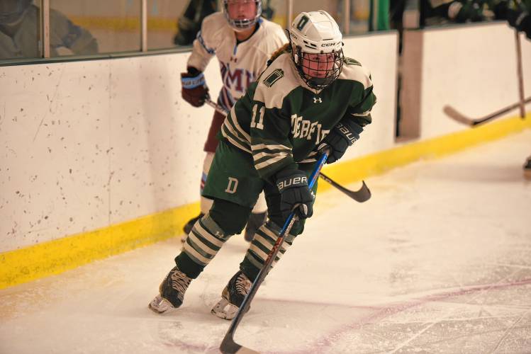 Deerfield Academy’s Allie Corrieri (11) skates toward the NMH zone during the Big Green’s NEPSAC victory on Wednesday at the Class of 1993 Hockey Rink in Deerfield.