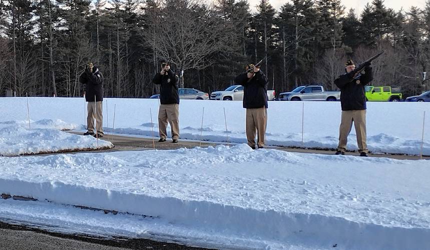 A firing team from Veterans of Foreign Wars Ovila Case Post 905 in Gardner fires a salute to Navy veteran William Carver during an internment ceremony held on Friday, Jan. 24.