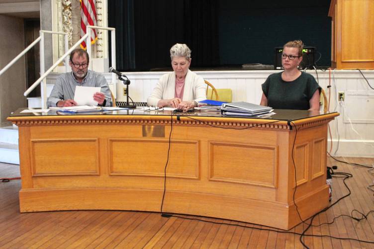 Orange Rent Control Board member Andrew Smith, Chair Jane Peirce and member Julie Davis at a public hearing in Orange Town Hall on Tuesday. They voted unanimously to increase Leisure Woods Estates mobile home park’s $398.40 monthly lot fees $51.60 for one year starting Dec. 1 and by an additional $50 beginning Dec. 1, 2025.