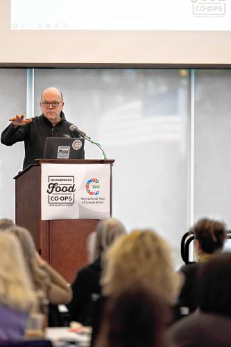 U.S. Rep. Jim McGovern discusses federal cuts with co-op members at the 14th annual Neighboring Food Co-op Association meeting at Greenfield Community College on Saturday.