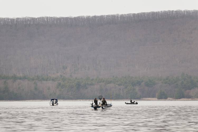 Fishing boats near the “Pass” on opening day at the Quabbin on Saturday with the Prescott Peninsula in the background.