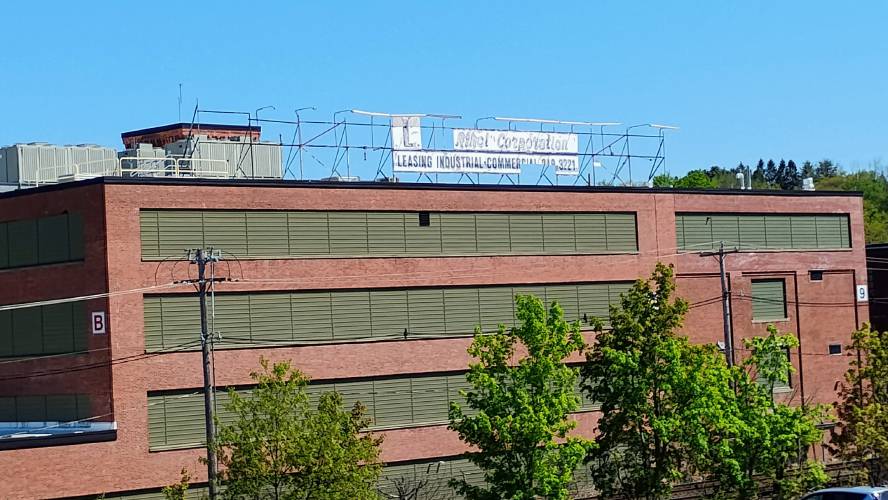 The LP Athol sign, which sits atop the MassGrow building. The LP Athol sign, which sits atop the MassGrow building.