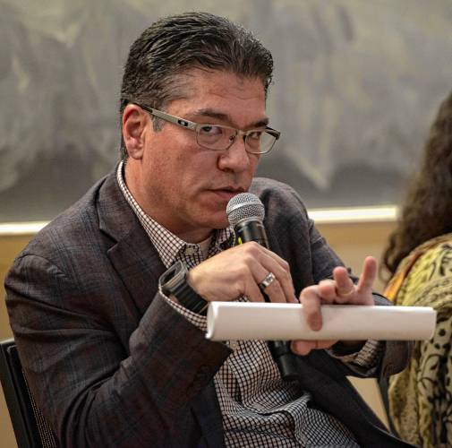 UMass Chancellor Javier Reyes answers questions during Tuesday’s special meeting of the Faculty Senate.