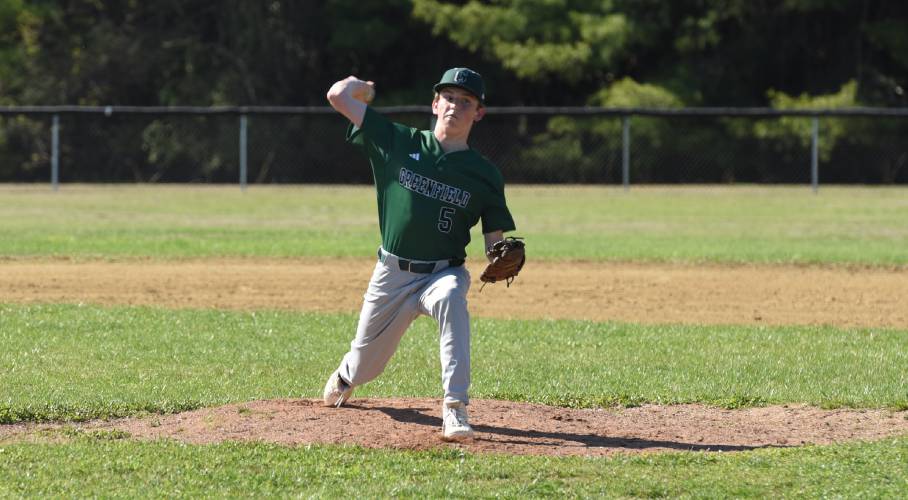 Greenfield’s Conner Bergeron (5) throws a pitch during the Green Wave’s 10-0 win over Granby on Monday afternoon in Granby.