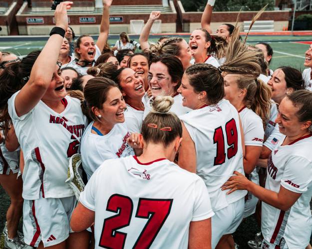 The UMass women’s lacrosse team celebrates after winning the Atlantic 10 Tournament title earlier this month.