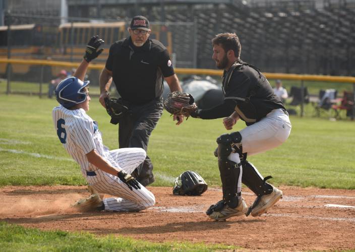 Pioneer catcher Braeden Tsipenyuk knocks down a throw at the plate against Hopedale during the MIAA Division 5 semifinal round on Wednesday in Westfield.