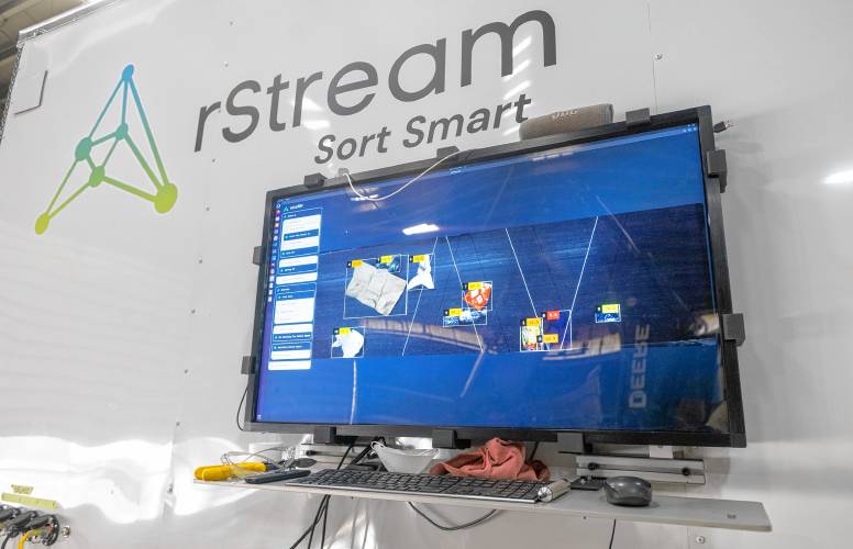 A screen on the outside of the rStream trash sorter shows the items the artificial intelligence is processing at the UMass Waste Recovery and Transfer Facility.