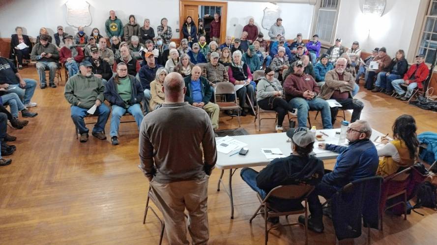Winchendon Department of Public Works Director Brian Croteau (standing) explains a proposed agreement to allow Royalston residents to use Winchendon's transfer station. 