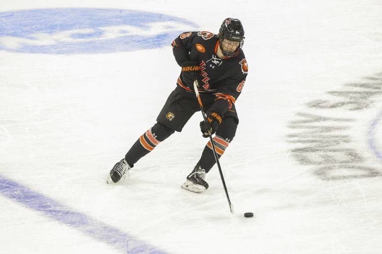 RIT’s Matthew Wilde handles the puck against Boston University in an NCAA tournament regional game in 2024 in Sioux Falls, S.D. RIT’s Matthew Wilde handles the puck against Boston University in an NCAA tournament regional game in 2024 in Sioux Falls, S.D.