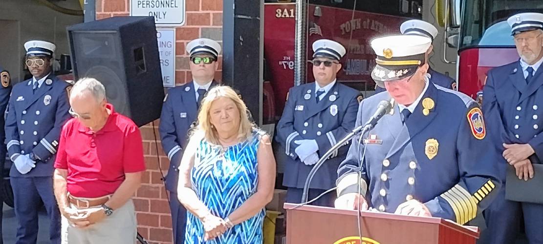 Finance and Warrant Advisory Committee Chair Ken Duffy and Selectboard member Rebecca Bialecki (at left) were named honorary members of the Athol Fire Department at a memorial ceremony held on Sunday, June 2.