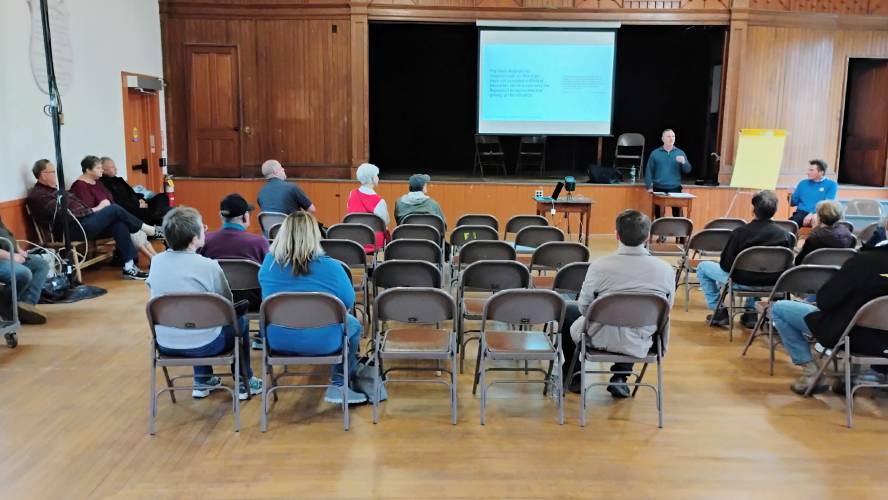 About two dozen Royalston residents showed up for Wednesday's informational meeting on a proposed Proposition 2½ override which would provide two full-time officers, one the chief, for the town's Police Department.
