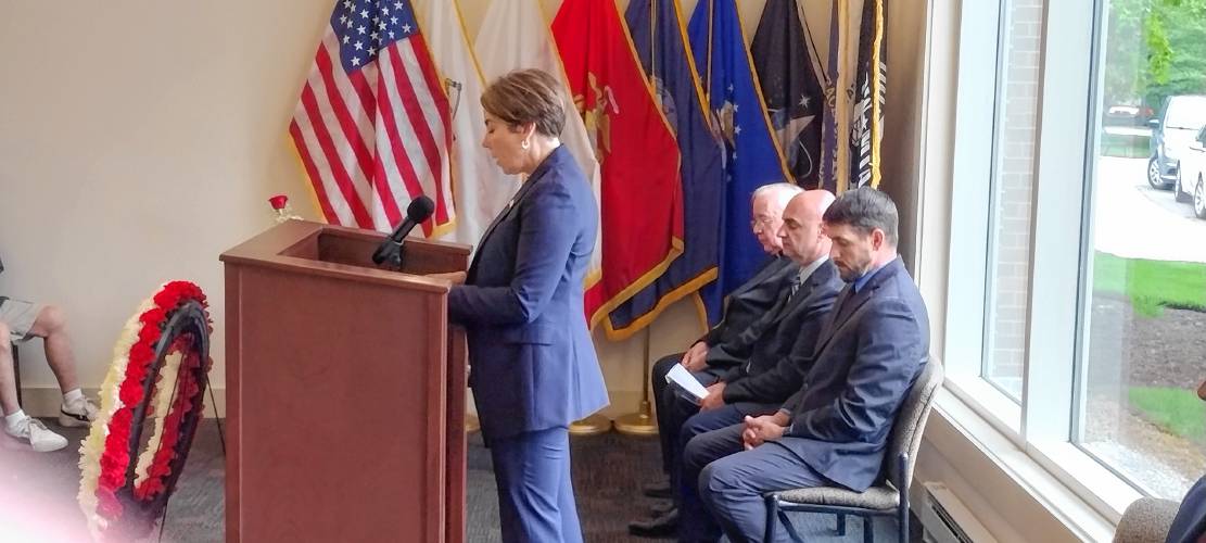 Gov. Maura Healey speaking at the Memorial Day ceremony at the Mass. Veterans Memorial Cemetery in Winchendon on Monday.