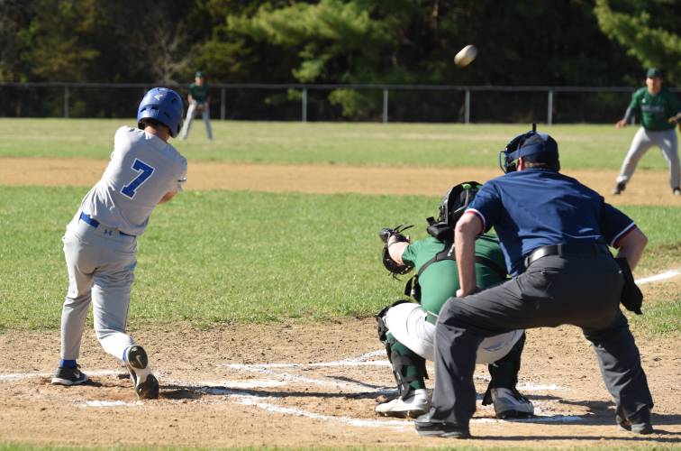 Granby’s Joseph Barrett (7) fouls one back and over the fence during the Rams’ loss to Greenfield on Monday afternoon in Granby.