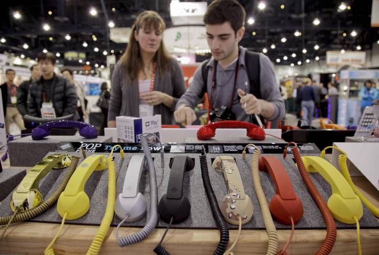 Cell phone hand sets are seen on display at the 2012 International Consumer Electronics show, on Jan. 13, 2012, in Las Vegas. 