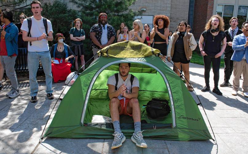 Umass students chant outside  Mahar Auditorium after  a Special Meeting of the Faculty Senate where Chancellor Javier Reyes and members of his administration made a presentation and answered questions about the campus protest, and policing actions occurring on May 7th through May 8th.