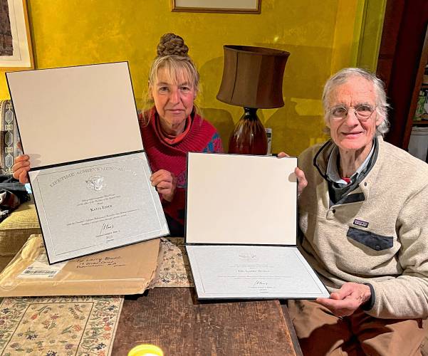 Katja Esser and Larry Buell show the U.S. President’s Awards for Volunteer Service they received for their many years of work in Petersham and the surrounding communities. Katja Esser and Larry Buell show the U.S. President’s Awards for Volunteer Service they received for their many years of work in Petersham and the surrounding communities.