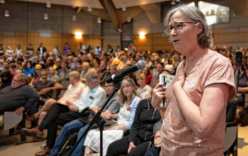 Brenda Bushouse, an associate professor of public policy at UMass, asks a question about the decision to use police force of Chancellor Javier Reyes  during a  Special Meeting of the Faculty Senate where  Reyes and  members of his administration made a presentation and answered questions about the campus protest, and policing actions occurring on May 7th through May 8th.