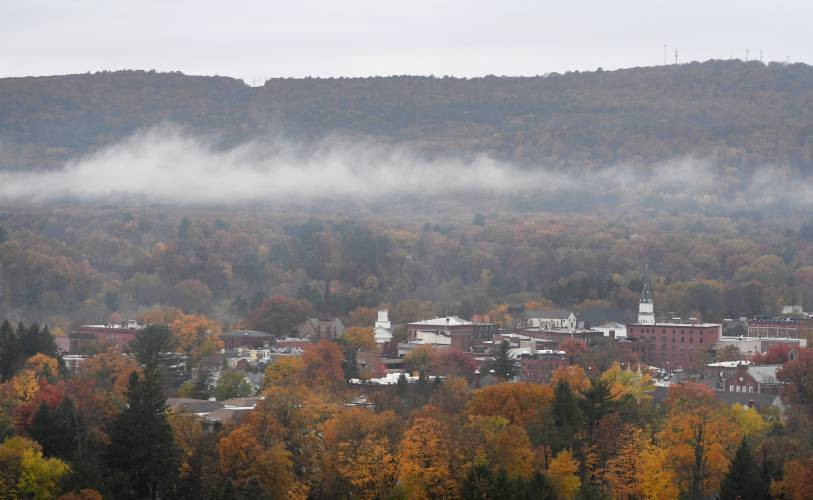 Patchy fog rolls over the Shelburne hills on a rainy day in Greenfield as seen from Poet’s Seat Tower. Patchy fog rolls over the Shelburne hills on a rainy day in Greenfield as seen from Poet’s Seat Tower.