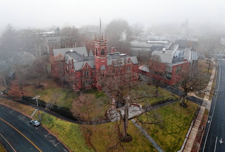 Fog rolls in over College Hall on the Smith College campus. Fog rolls in over College Hall on the Smith College campus.