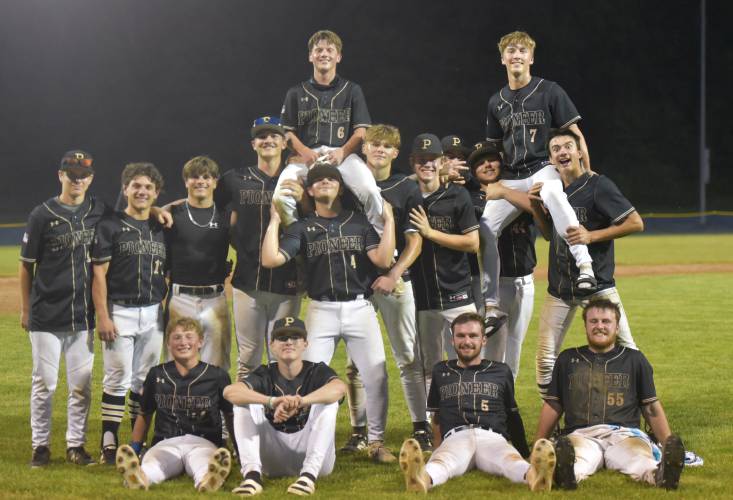 The Pioneer baseball team poses for a photo after defeating the Georgetown Royals in extra innings in the MIAA Division 5 Round of 16 on Thursday night in Northfield.