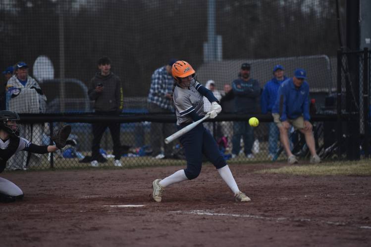 Franklin Tech's Kylee Gamache cracks a base hit against Turners Falls on Friday at Gary Mullins Field in Turners. Gamache recorded her 100th career hit on Friday. 