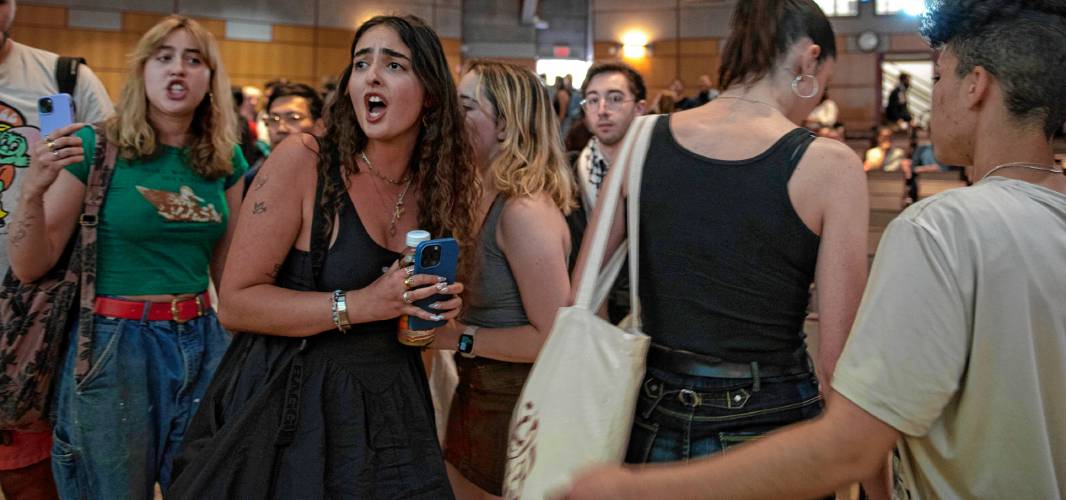 Umass students chant and yell as they leave Mahar Auditorium after they leave a Special Meeting of the Faculty Senate where Chancellor Javier Reyes
and members of his administration made a presentation and answered questions about the campus protest, and policing actions occurring on May 7th through May 8th.
