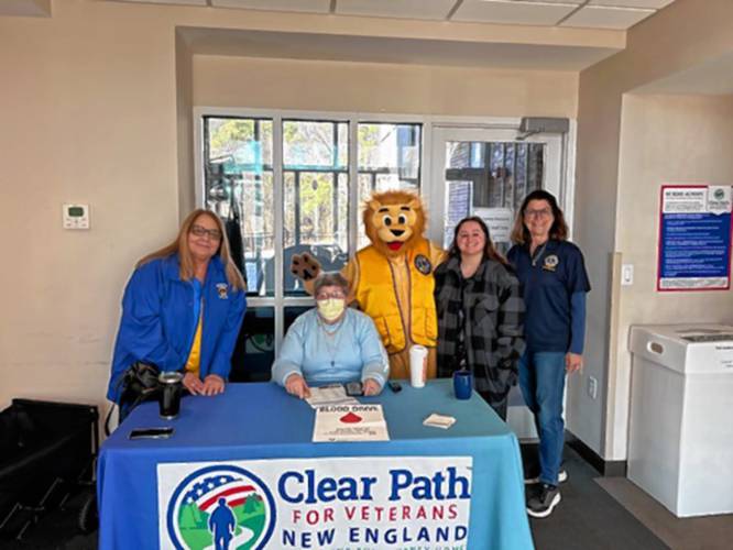 Lions Club members from Petersham, Harvard and Grafton at the sign-in table for a blood drive.