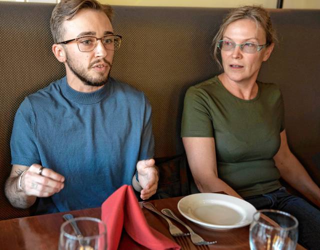 Mad Lawrence, a bartender at Eastside Grill, talks about why the staff there feels strongly about voting no on Question 5. To the right is Aly Didkovskyi. 