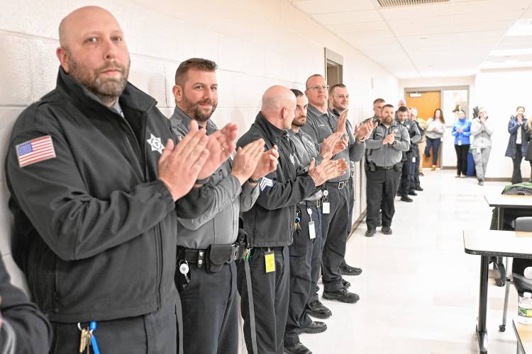 Staff members applaud Franklin County’s new interim Sheriff Lori Streeter after she was sworn in at the Franklin County Jail and House of Correction in Greenfield on Friday. 