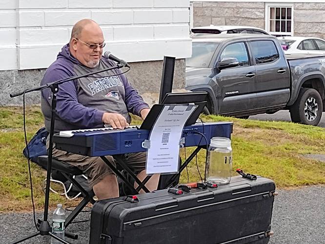 Ryan Hood entertained visitors to the National Night Out event in Royalston on Tuesday, Oct. 1.