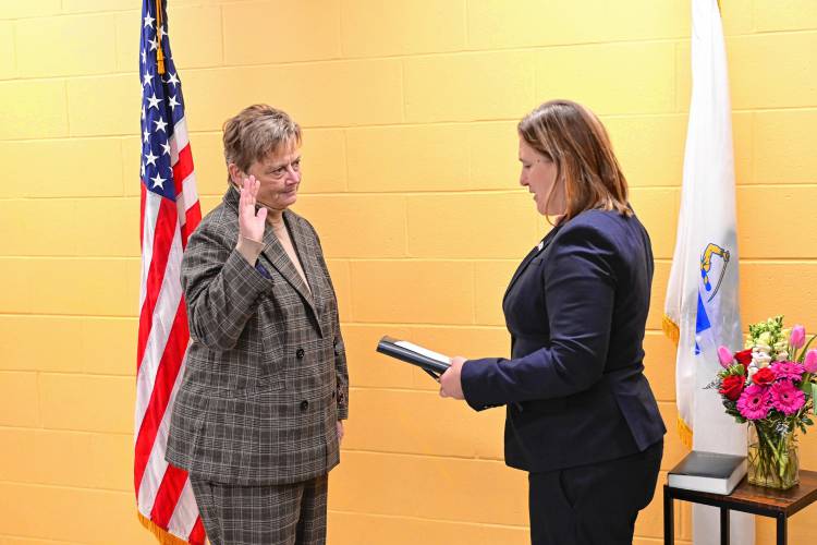 Franklin County’s new interim Sheriff Lori Streeter is sworn in by Kristen Elechko, who serves as western Massachusetts director with the Governor’s Office, in a ceremony held at the Franklin County Jail and House of Correction in Greenfield on Friday.