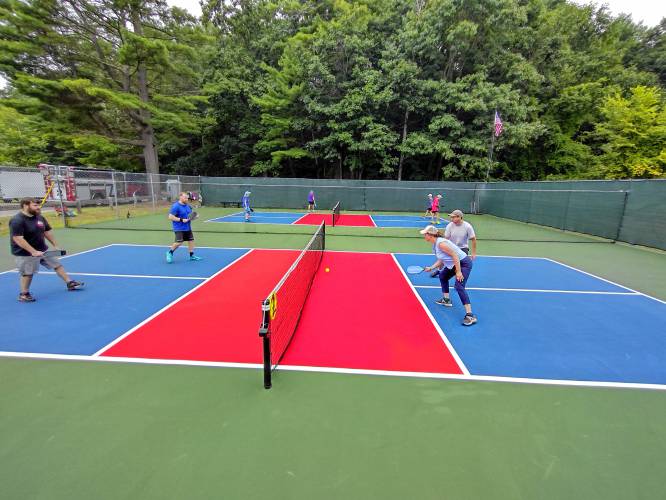 The three resurfaced pickleball courts at Silver Lake Park were officially opened on Saturday, Aug. 17, after which the games began.