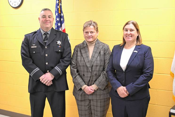 Franklin County’s new interim Sheriff Lori Streeter, center, is flanked by new Superintendent Jason Kilgour, left, and Kristen Elechko, western Massachusetts director with the Governor’s Office, at the Franklin County Jail and House of Correction on Friday. 