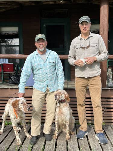Owner Chris Lorenz (left) and Old Hemlock Newsletter Editor Glenn Jonsson pose with Chris’ two fine Old Hemlock English setters at Lakewoods Camp on Lower Richardson Lake in Rangely Maine.