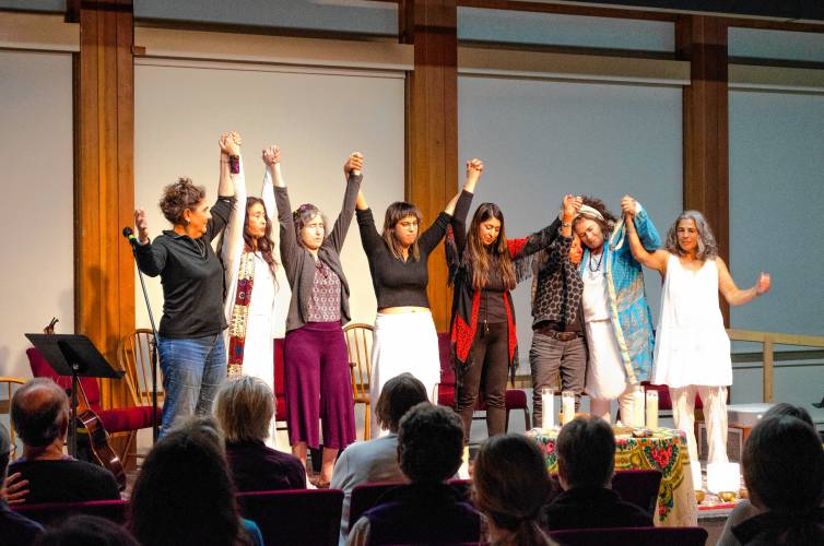 The four members of the “Women of Vision” group, along with several audience members, at the All Souls Unitarian Universalist Church in Brattleboro, Vermont, on Saturday.