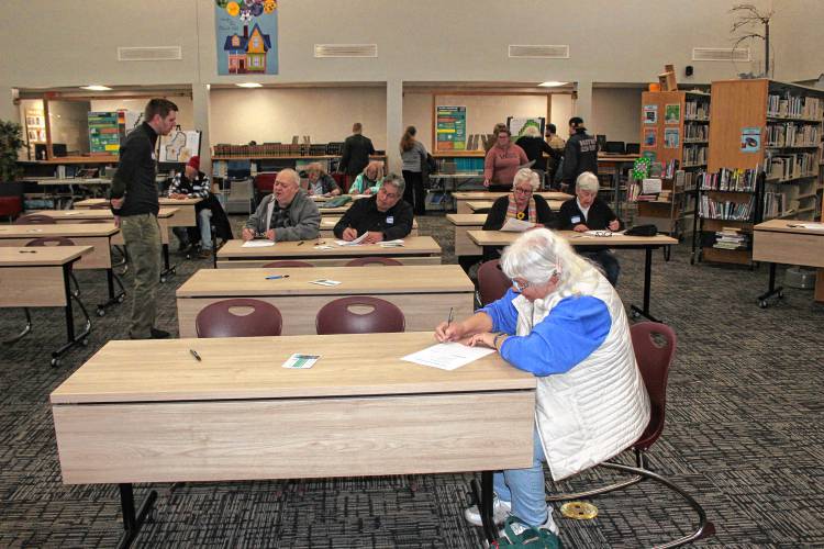 Orange residents visited the Ralph C. Mahar Regional School library this week for a community engagement session as part of the process of developing a new long-range plan. The format was a series of roundtables where attendees shared comments and asked questions about the various topics covered in the plan.