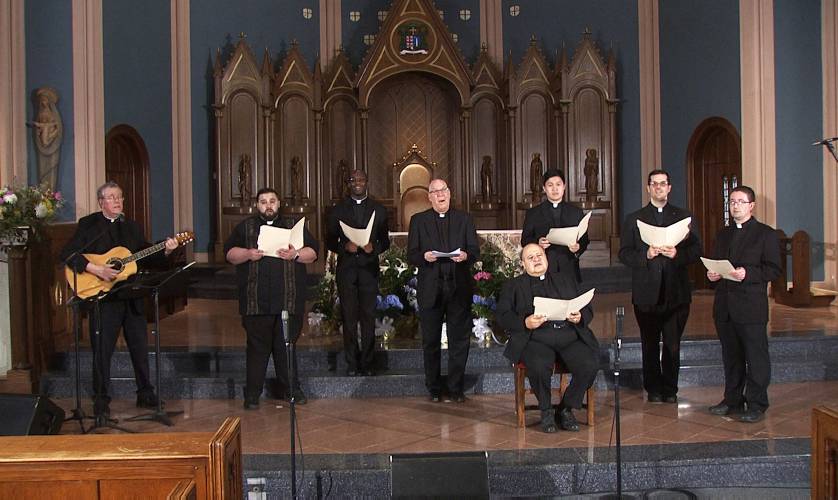 The Singing Priests, a group of roughly 12 Catholic priests that serenades audiences with setlists that include sacred hymns and classic popular hits from the Beatles, Bob Dylan and others, have a summer concert scheduled for Our Lady of Peace at 7 p.m. on May 22.