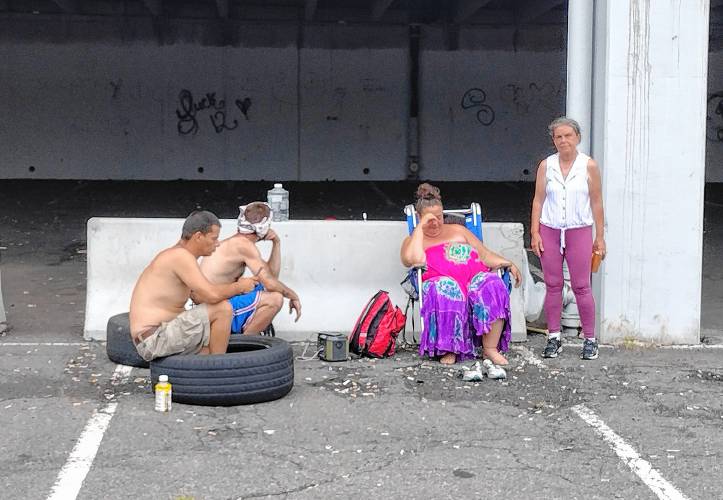 Several of Athol's homeless who currently call the downtown municipal parking garage home. All say the community is in desperate need of a homeless shelter and more affordable housing. Several of Athol's homeless who currently call the downtown municipal parking garage home. All say the community is in desperate need of a homeless shelter and more affordable housing.