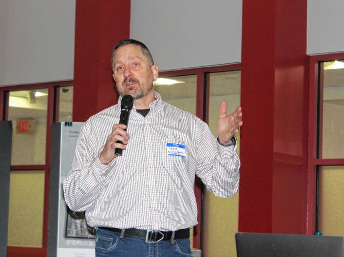 Steven Whitman, founder of Resilience Planning & Design in Plymouth, New Hampshire, speaks at the beginning of a community engagement session at Ralph C. Mahar Regional School  this week.