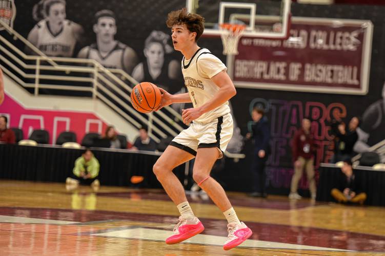 Pioneer’s Kurt Redeker (3) surveys the Hoosac Valley defense during the Panthers’ 68-53 loss in the Hoophall Classic at Springfield College’s Blake Arena on Thursday.