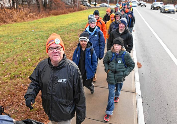 Congressman Jim McGovern participates in the March for the Food Bank with Monte Belmonte as it makes its way up Greenfield Road (Routes 5 and 10) in Deerfield on Tuesday.