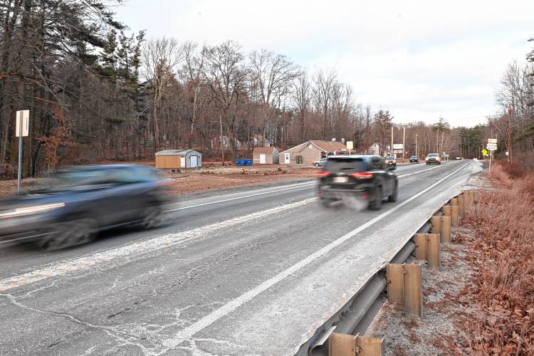 Vehicles pass the New Salem General Store on Daniel Shays Highway (Route 202) in New Salem. Town officials are working to determine ways to improve safety on Route 202.
