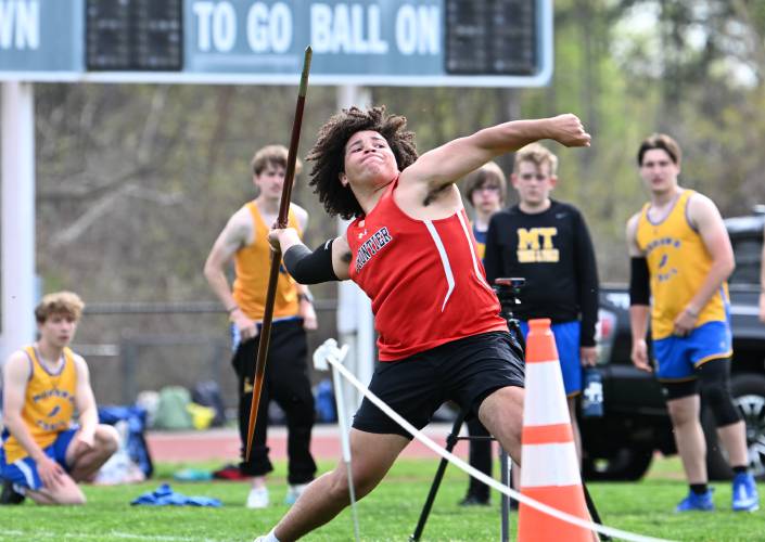 Frontier’s Julian Adams  tosses the javelin in South Deerfield on Tuesday. 